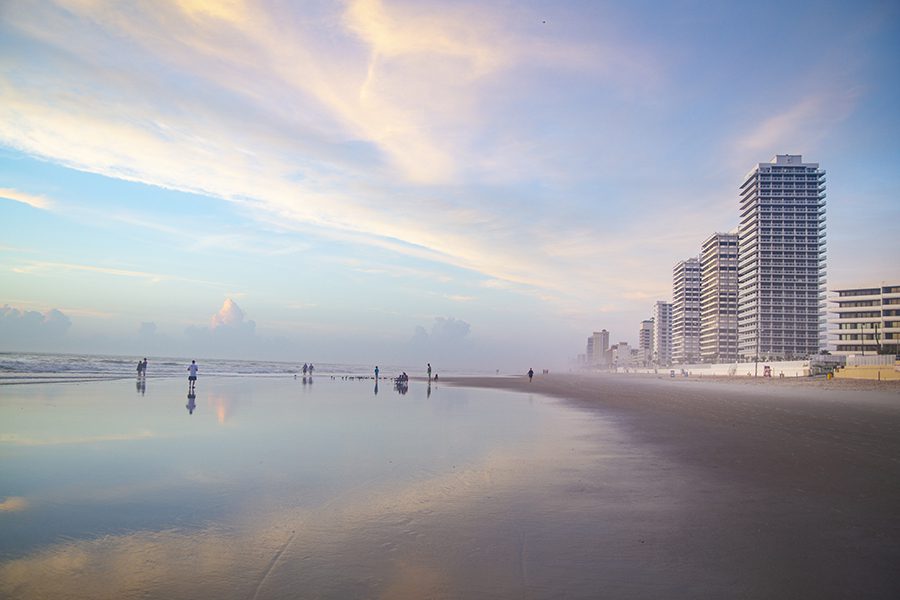 Location - Foggy Morning at the Beach with Buildings Along the Coast