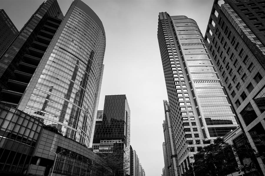 Miscellaneous FAQs - Black and White View of Skyscrapers